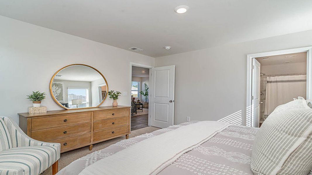 Representative furnished interior of a home built from the Lewis by D.R. Horton in The Forest at Black Bear, Longs (Image 8).