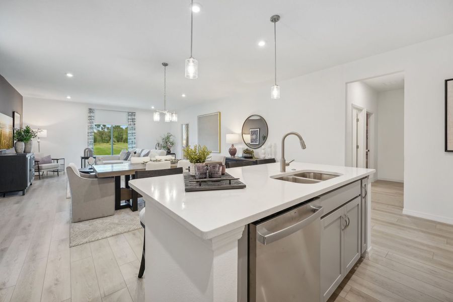 Kitchen Over Looks Dining and Living of The Webber at Country Club Estates