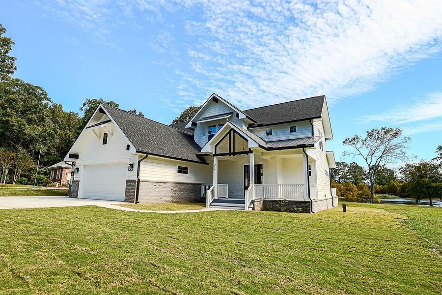 Front exterior of a new home in , Manning, SC, highlighting curb appeal (Image 24).