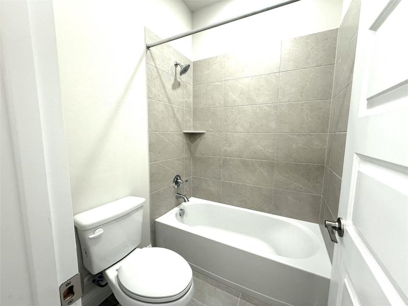 Full bath with  shower combination and toilet