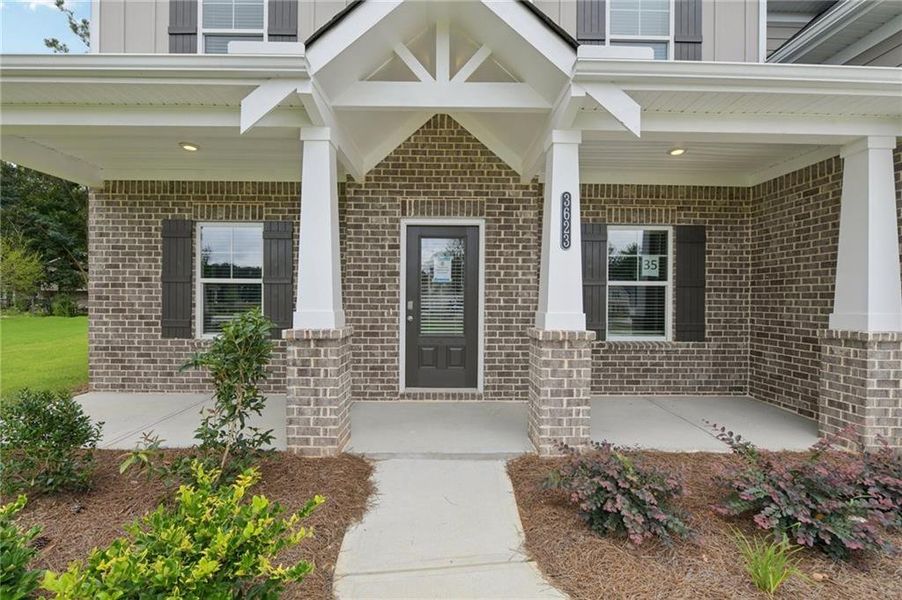 Exterior details and patio area of a home in Stephen's Landing, Loganville (Image 4).