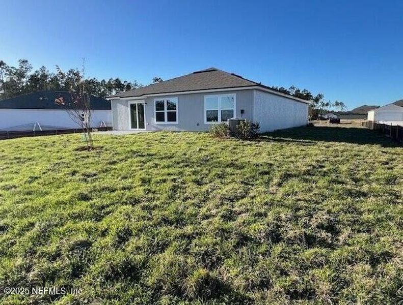 Exterior details and patio area of a home in Sawmill Branch, Palm Coast (Image 25). Exterior details and patio area of a home in Sawmill Branch, Palm Coast (Image 25).