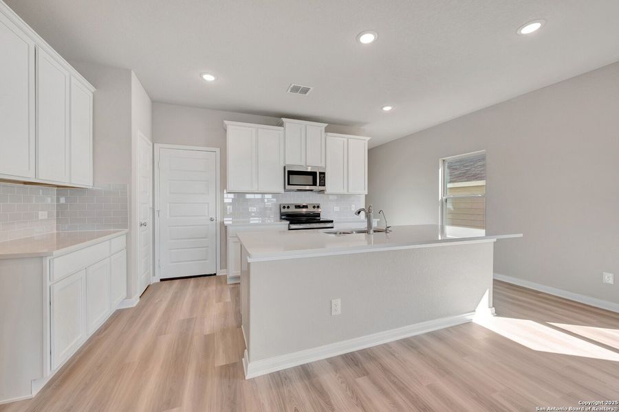Furnished interior view inside a new home in Paloma Park, Converse (Image 9).