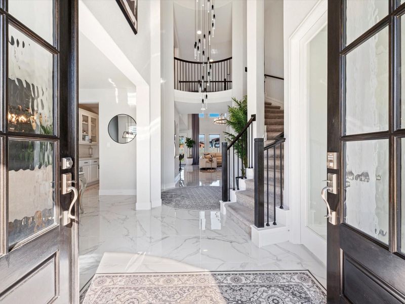 Beautiful, glass-pane double-door entry, opens wide for you and guests. Perfect to move in large scale furniture with ease!