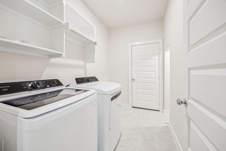 Utility Room in the Claret home plan by Trophy Signature Homes – REPRESENTATIVE PHOTO Utility Room in the Claret home plan by Trophy Signature Homes – REPRESENTATIVE PHOTO