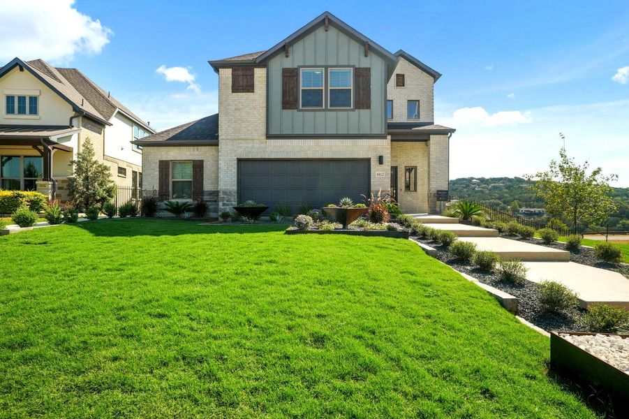Front exterior of a new home in Lakeside at Tessera, Lago Vista, TX, highlighting curb appeal (Image 2). Front exterior of a new home in Lakeside at Tessera, Lago Vista, TX, highlighting curb appeal (Image 2).