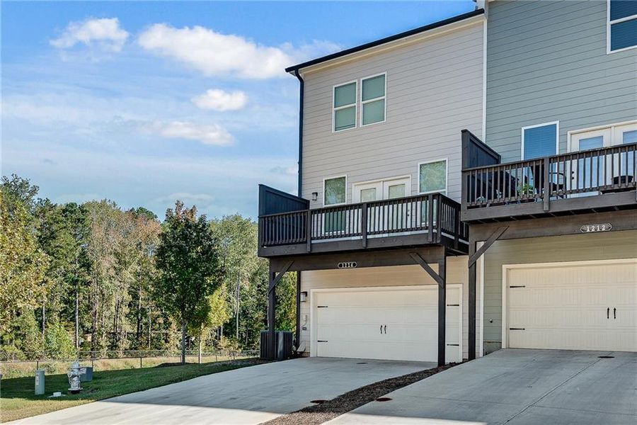 Front exterior of a new home in Waverly at Buice Lake, Acworth, GA, highlighting curb appeal (Image 23). Front exterior of a new home in Waverly at Buice Lake, Acworth, GA, highlighting curb appeal (Image 23).