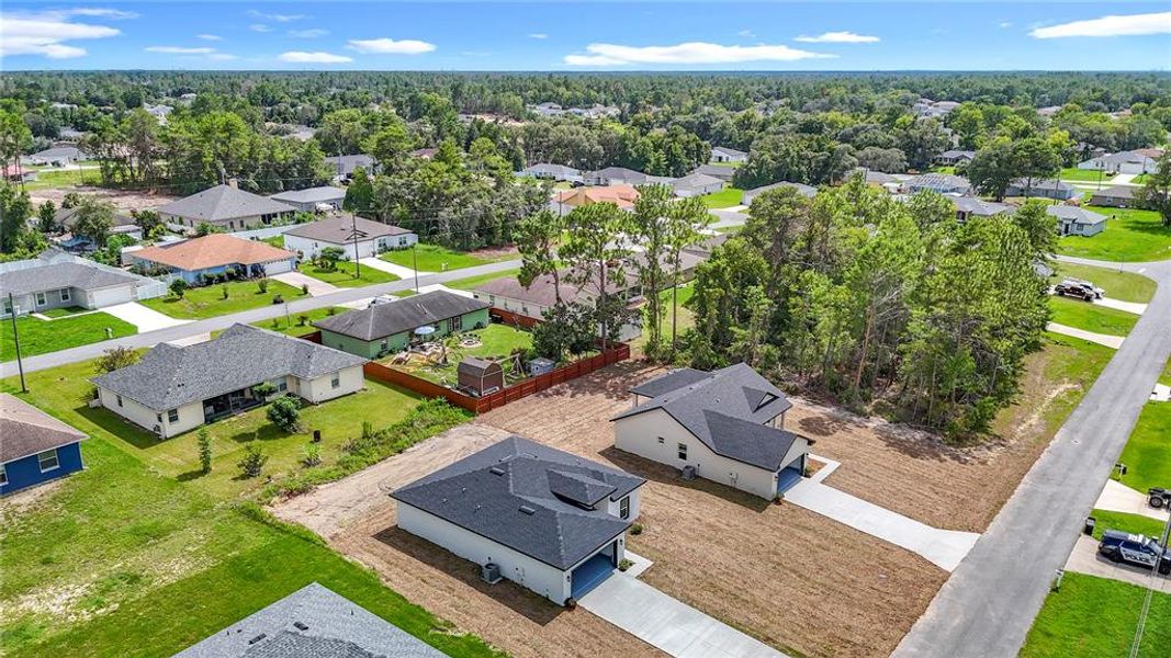 Front exterior of a new home in , Ocala, FL, highlighting curb appeal (Image 22).
