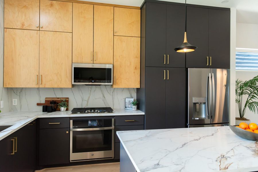 Kitchen: GE Profile Appliances: Upgraded Appliance Package Includes: Fridge, wine cooler, stove top, oven, dishwasher and microwave. Kitchen: GE Profile Appliances: Upgraded Appliance Package Includes: Fridge, wine cooler, stove top, oven, dishwasher and microwave.