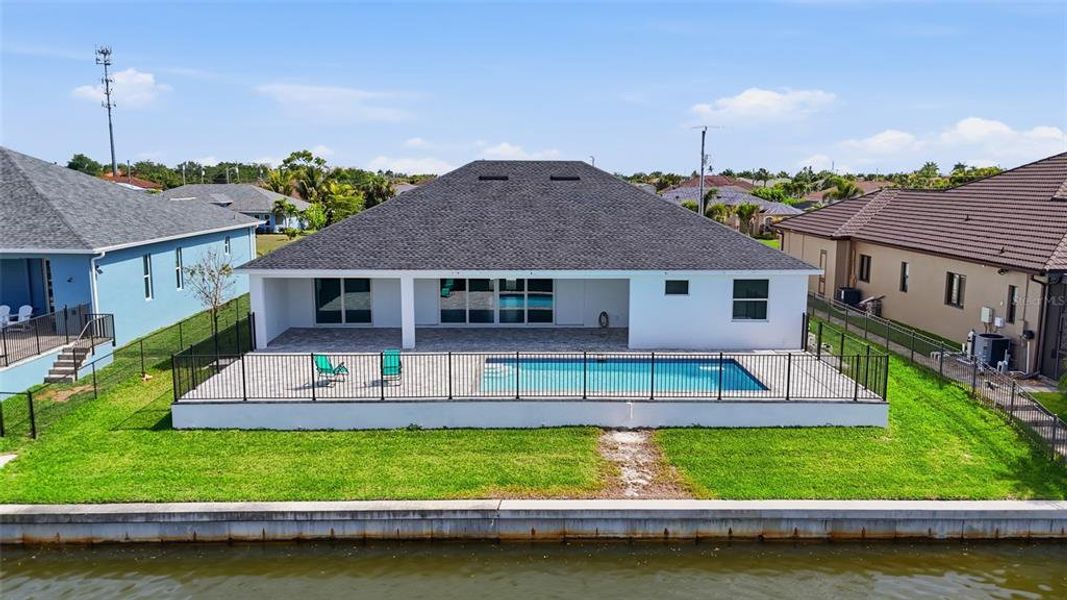 Exterior details and patio area of a home in , Cape Coral (Image 32).