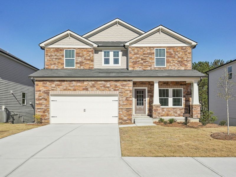 Front exterior of a new home in Ivey Township, Dallas, GA, highlighting curb appeal (Image 1).