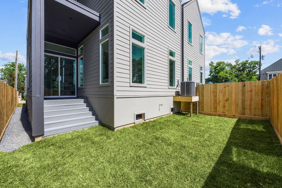 Exterior details and patio area of a home in , Houston (Image 4). Exterior details and patio area of a home in , Houston (Image 4).
