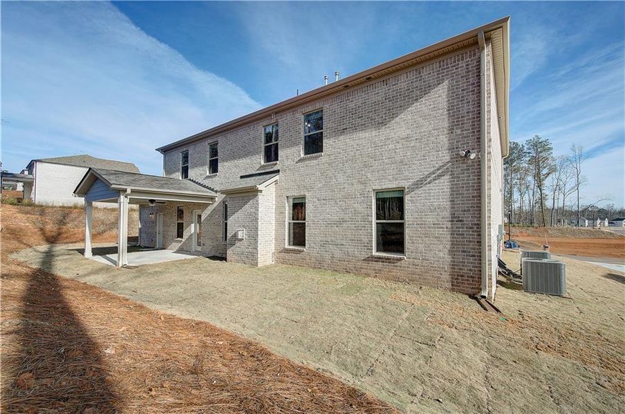 Exterior details and patio area of a home in Trinity Park, McDonough (Image 3).