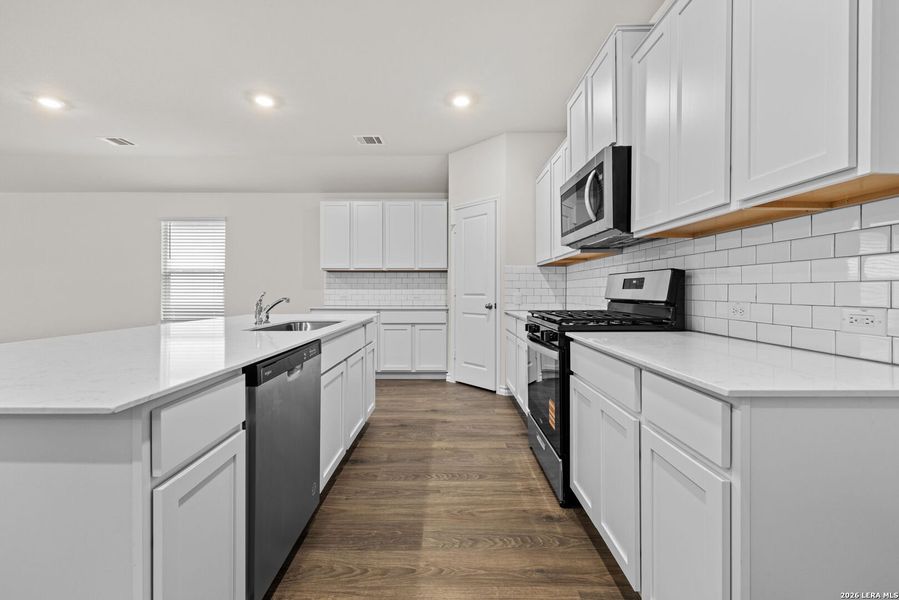 Furnished interior view inside a new home in Redbird Ranch, San Antonio (Image 6).