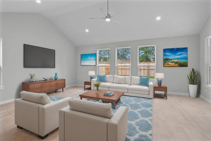 Gather the family and guests together in your lovely family room! Featuring high ceilings, recessed lighting, ceiling fan, custom paint, gorgeous floors and large windows that provide plenty of natural lighting throughout the day.