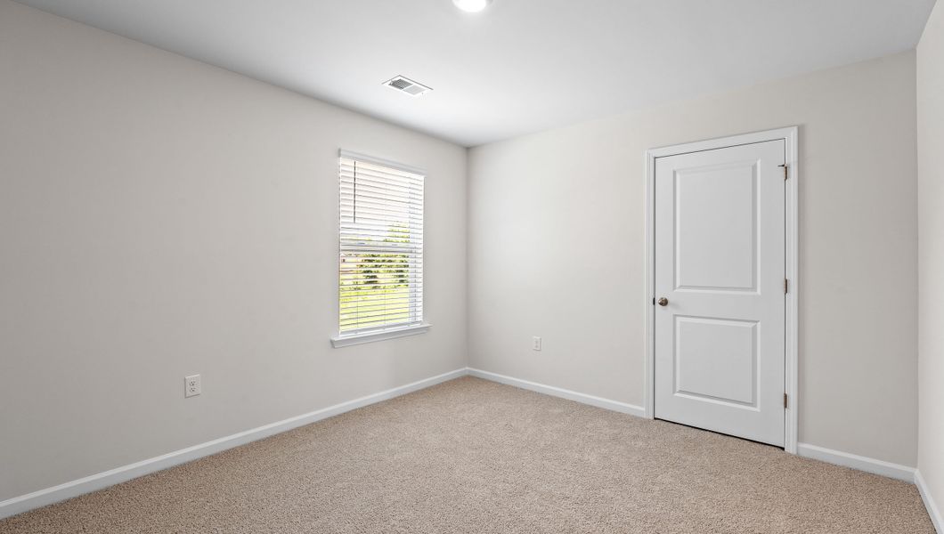 Representative unfurnished interior of a home built from the ELSTON by D.R. Horton in Harrier Point, Woodruff (Image 24).