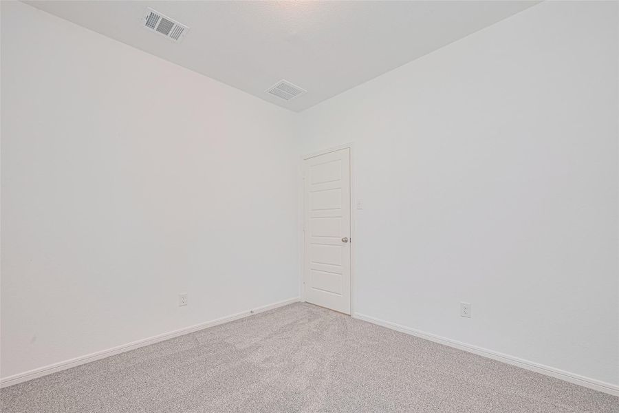 Spacious, unfurnished interior of a new home in Sunterra, Katy (Image 34).