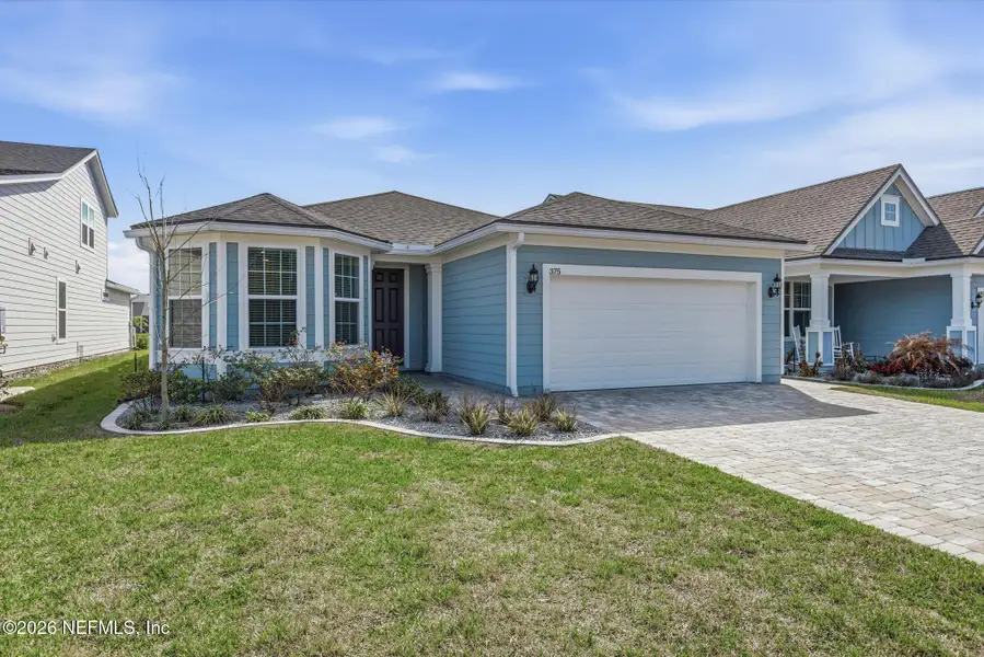 Front exterior of a new home in , St. Augustine, FL, highlighting curb appeal (Image 31).