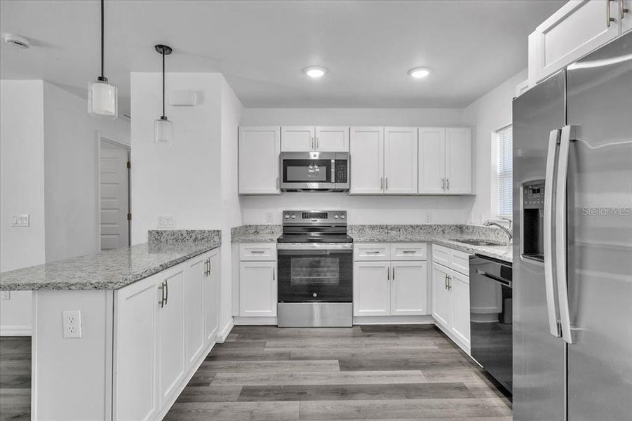 Furnished interior view inside a new home in , Punta Gorda (Image 8).