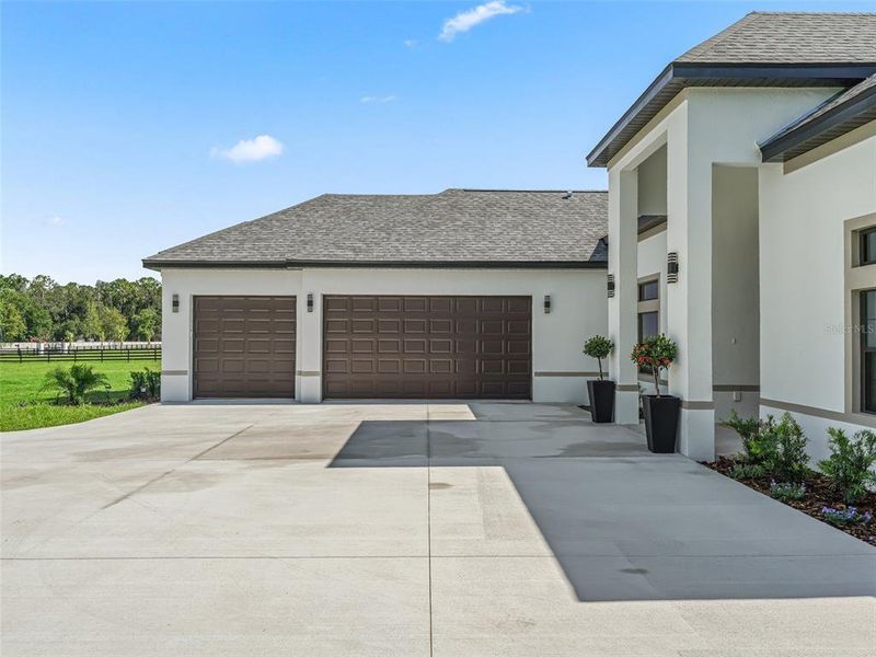 Front exterior of a new home in , Ocala, FL, highlighting curb appeal (Image 26).