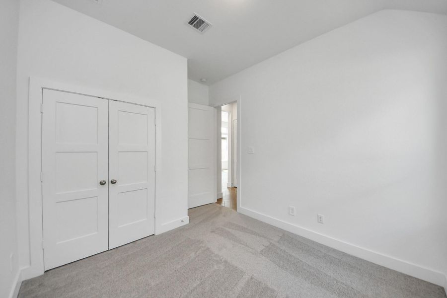 Spacious, unfurnished interior of a new home in Amira: Premier Collection, Tomball (Image 15).