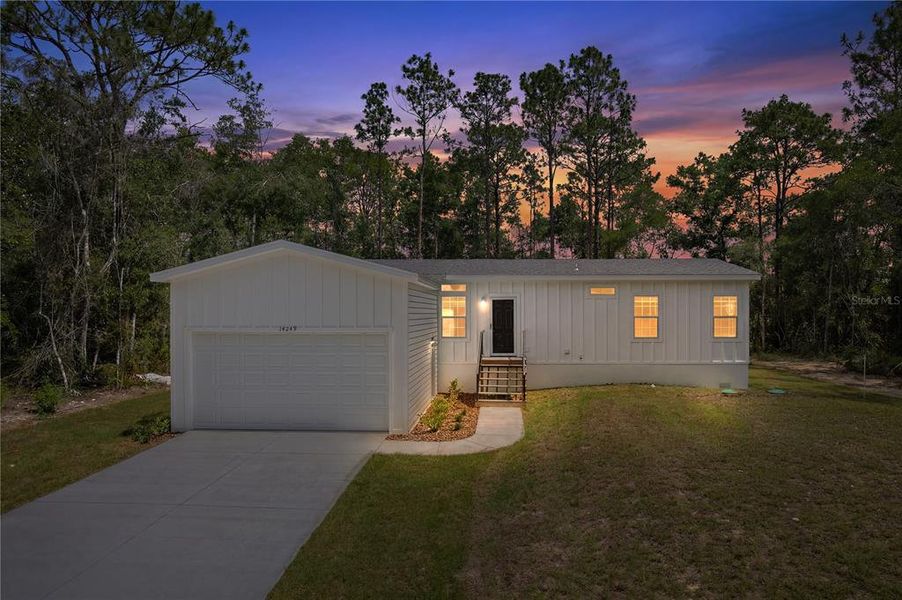 Front exterior of a new home in , Weeki Wachee, FL, highlighting curb appeal (Image 1). Front exterior of a new home in , Weeki Wachee, FL, highlighting curb appeal (Image 1).