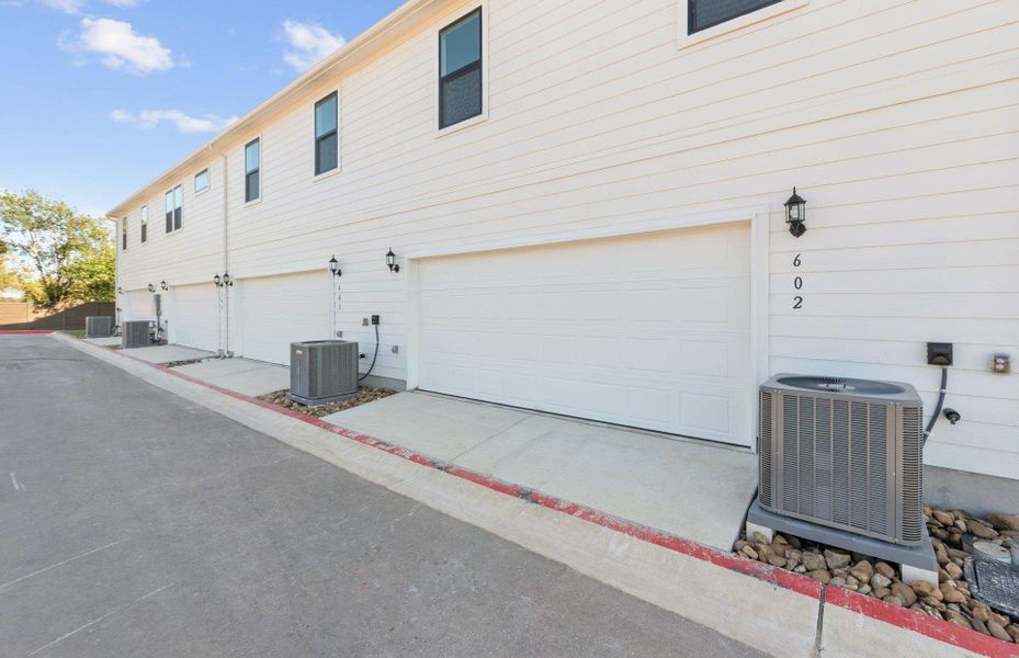 Exterior details and patio area of a home in Monarch on Main, Round Rock (Image 17).