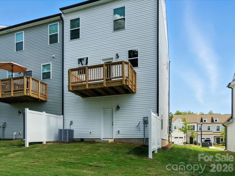 Exterior details and patio area of a home in The Landings at Catawba River, Charlotte (Image 28).