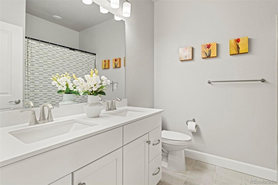 Furnished interior view inside a new home in Murphy Creek, Aurora (Image 7).