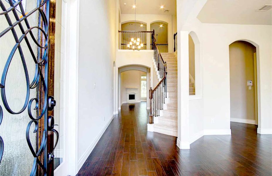 Representative unfurnished interior of a home built from the 4198 by Ravenna Homes in The Woodlands Hills 65′, Willis (Image 13).