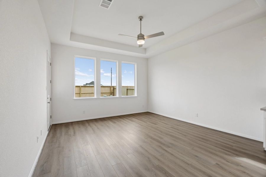 Gathering room. Sample product photo. Actual exterior and interior selections may vary by homesite. Photo may be virtually staged.