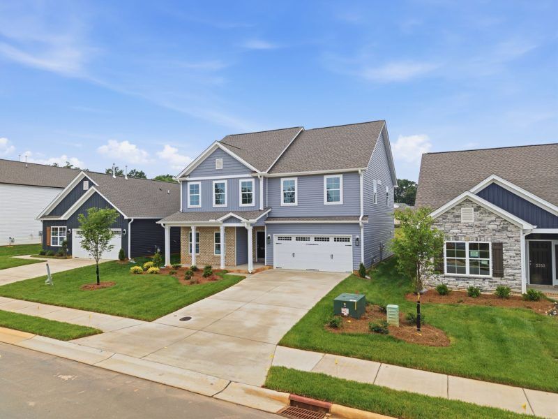 Front exterior of a new home in Sullivans Reserve, Walkertown, NC, highlighting curb appeal (Image 25).