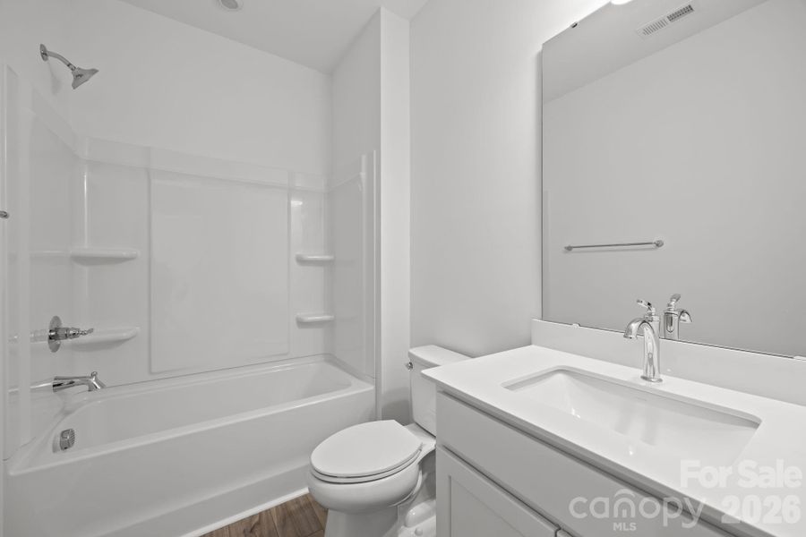 Secondary Bathroom Photos are representative and may not reflect the exact home, finishes, or features.
