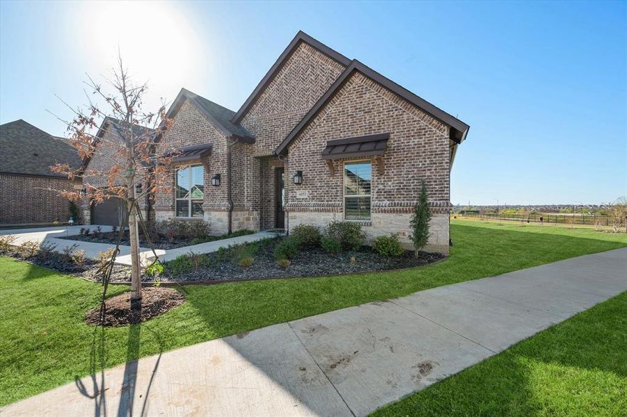 Front exterior of a new home in , Fort Worth, TX, highlighting curb appeal (Image 2). Front exterior of a new home in , Fort Worth, TX, highlighting curb appeal (Image 2).