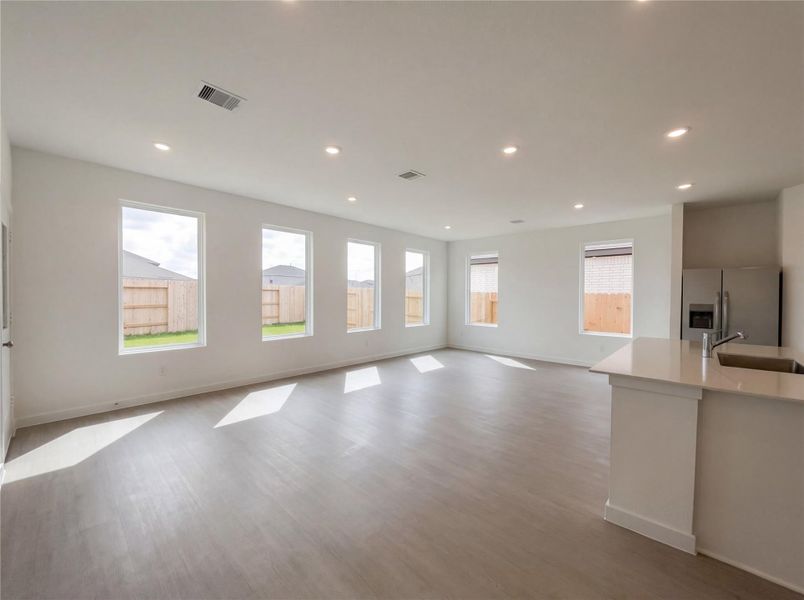 Spacious, unfurnished interior of a new home in Sunterra, Katy (Image 13).