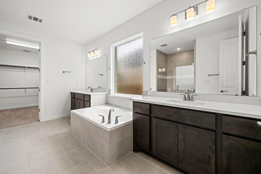 Primary Bath retreat with dual vanities & garden tub