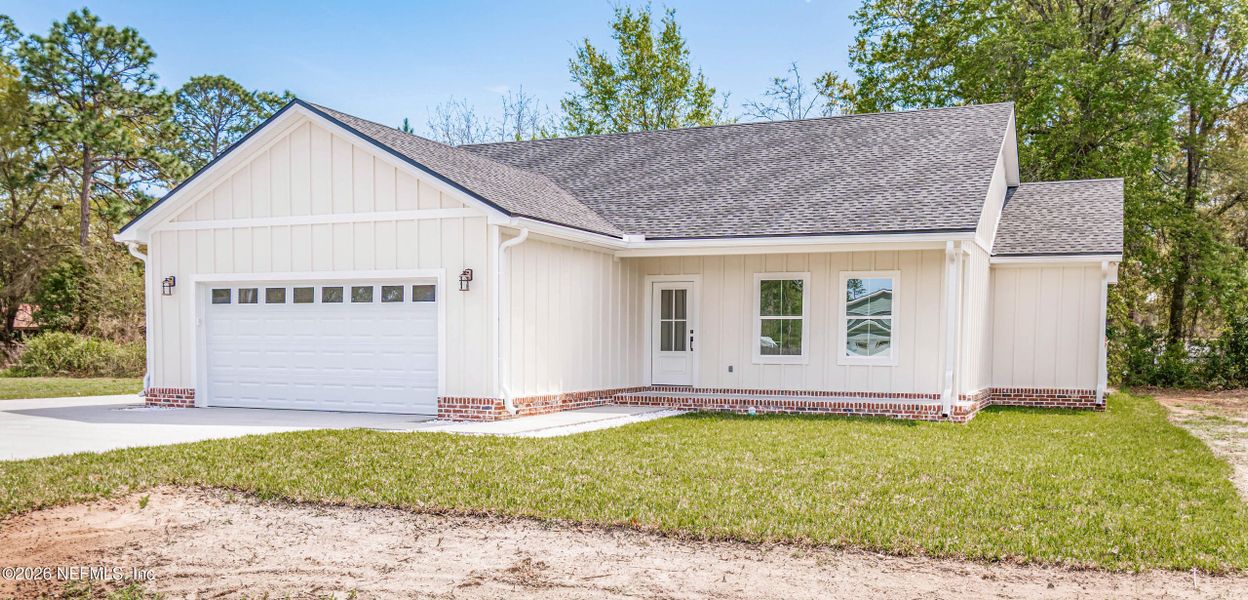 Front exterior of a new home in , Macclenny, FL, highlighting curb appeal (Image 30).