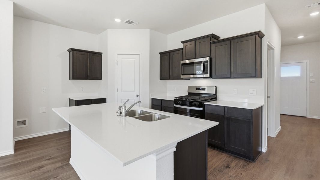 Furnished interior view inside a new home in Windrose, Pilot Point (Image 3). Furnished interior view inside a new home in Windrose, Pilot Point (Image 3).
