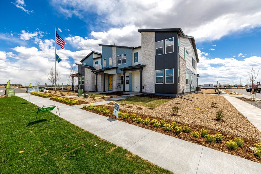 Front exterior of a new home in Painted Prairie, Aurora, CO, highlighting curb appeal (Image 21).