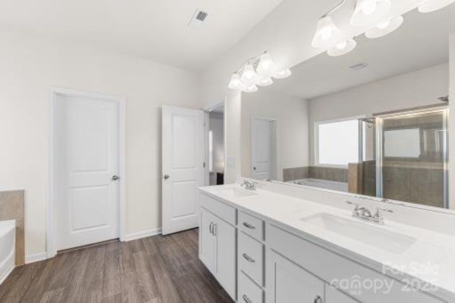 Furnished interior view inside a new home in Wilora Pond, Charlotte (Image 27). Furnished interior view inside a new home in Wilora Pond, Charlotte (Image 27).