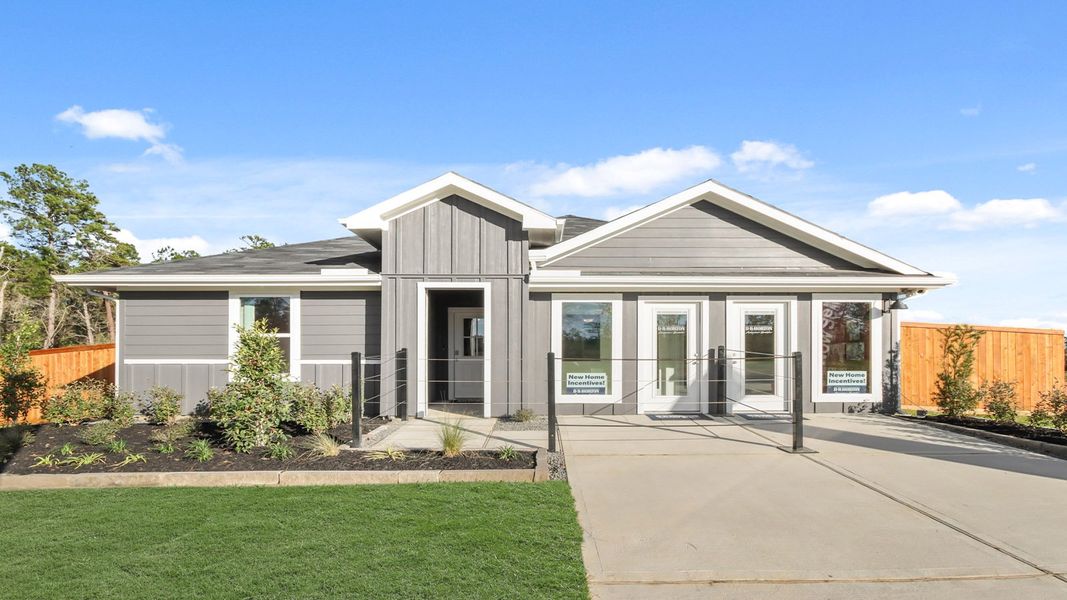 Front exterior of a home in the New Waverly Station community, located in New Waverly, TX (Image 12).