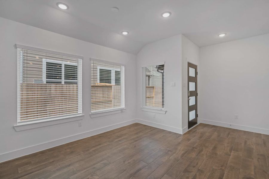 Representative unfurnished interior of a home built from the Carriagehouse by Chesmar Homes in Meridiana Townhomes, Iowa Colony (Image 83).
