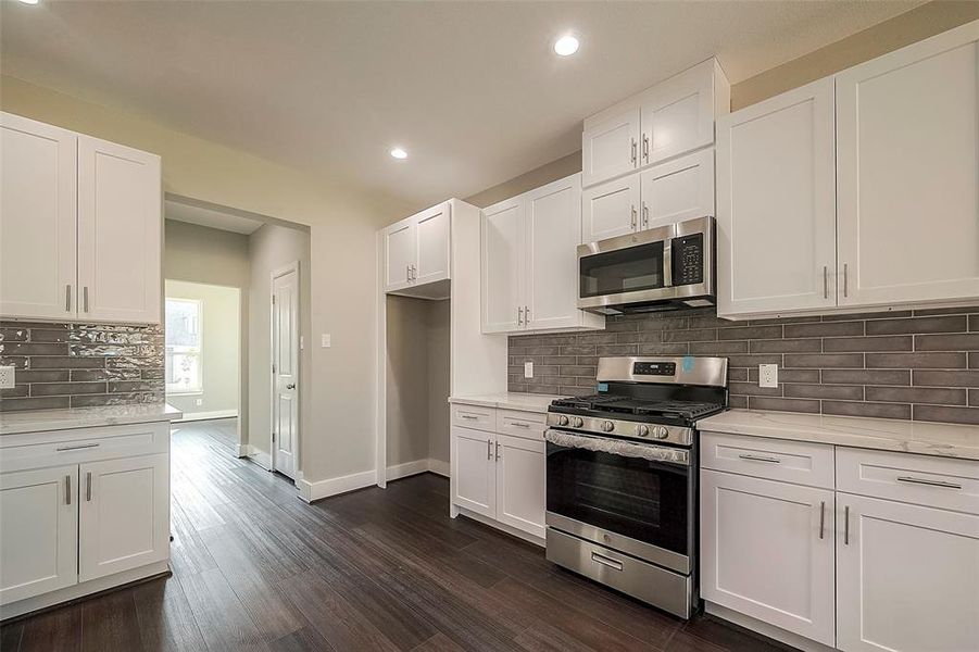 Kitchen with stainless steel appliances