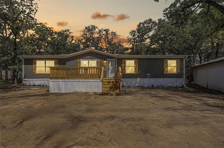 Front exterior of a new home in , Azle, TX, highlighting curb appeal (Image 23).