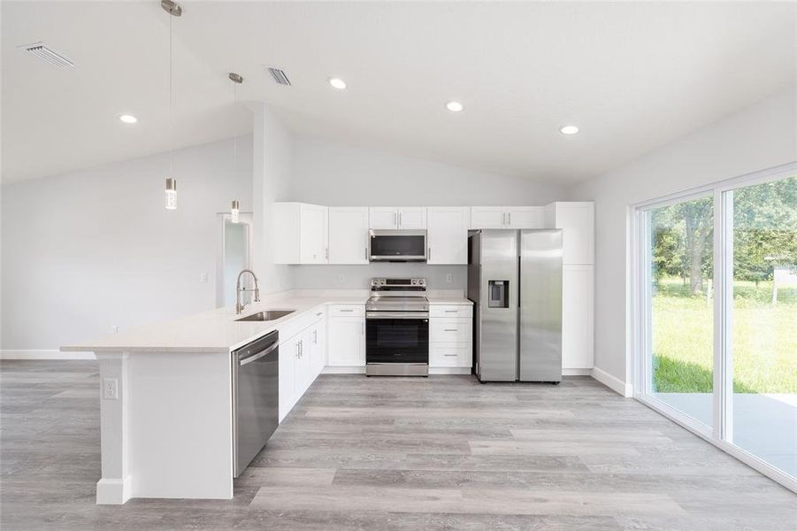 Furnished interior view inside a new home in , Dunnellon (Image 7).