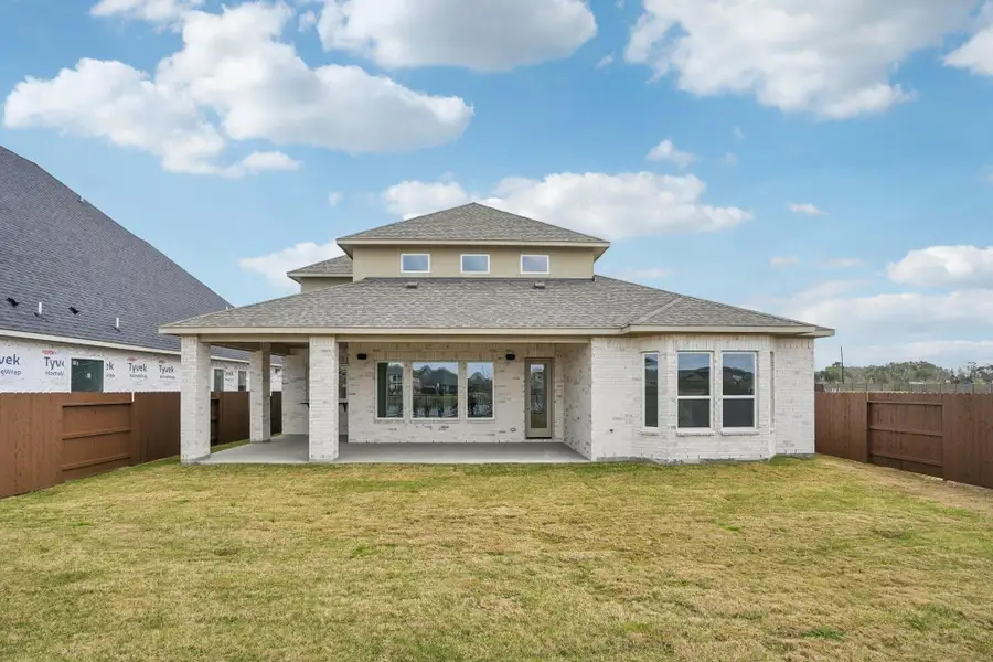Exterior details and patio area of a home in Del Bello Lakes 60', Manvel (Image 4).