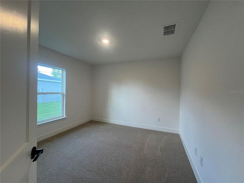 Spacious, unfurnished interior of a new home in Orange Blossom Hills, Summerfield (Image 14).
