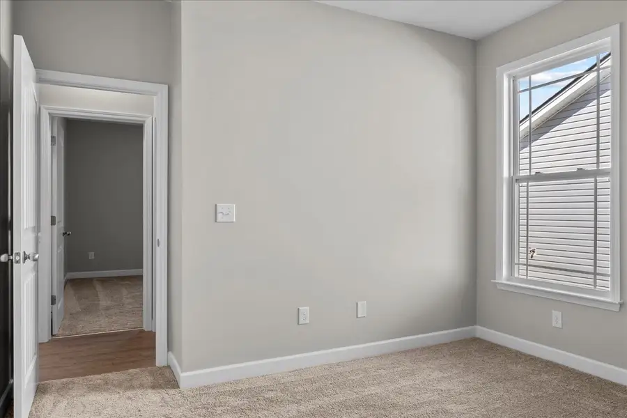Representative unfurnished interior of a home built from the Cherokee by Enchanted Homes in Lonesome Dove, San Antonio (Image 37).
