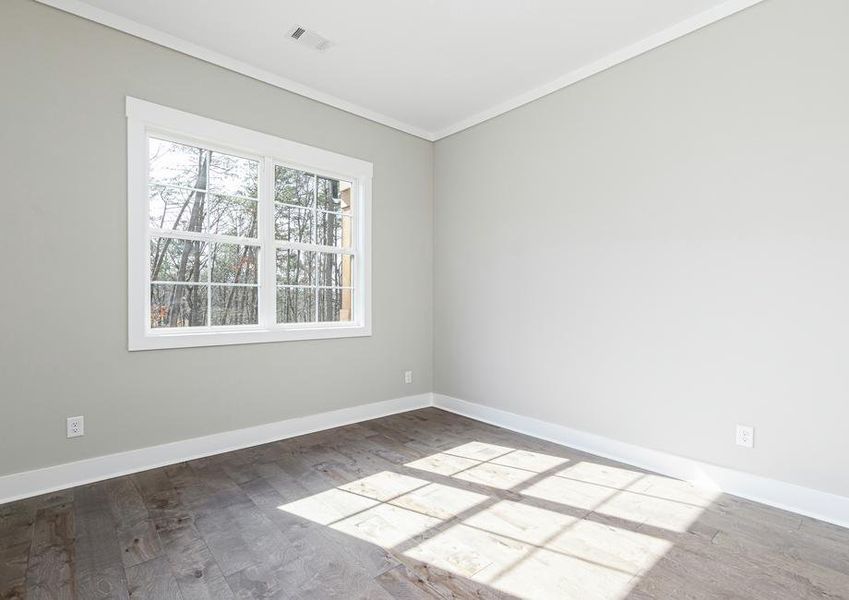 Large windows fill the secondary bedrooms with plenty of light.