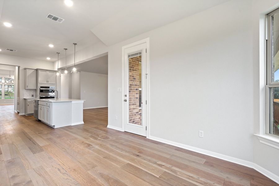 Representative unfurnished interior of a home built from the Palmer by Ashton Woods in The Estates at La Cima, San Marcos (Image 54).